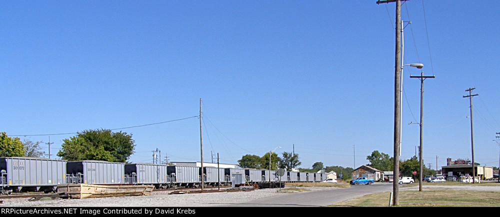 Ballast train almost through the Main St. crossing.